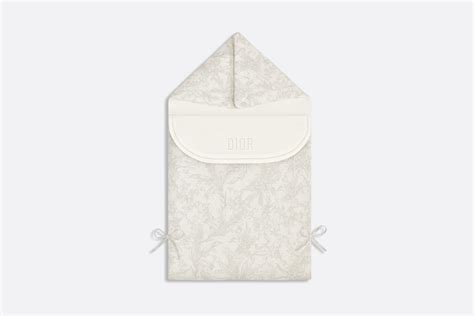 dior ivory cotton sleeping bag.